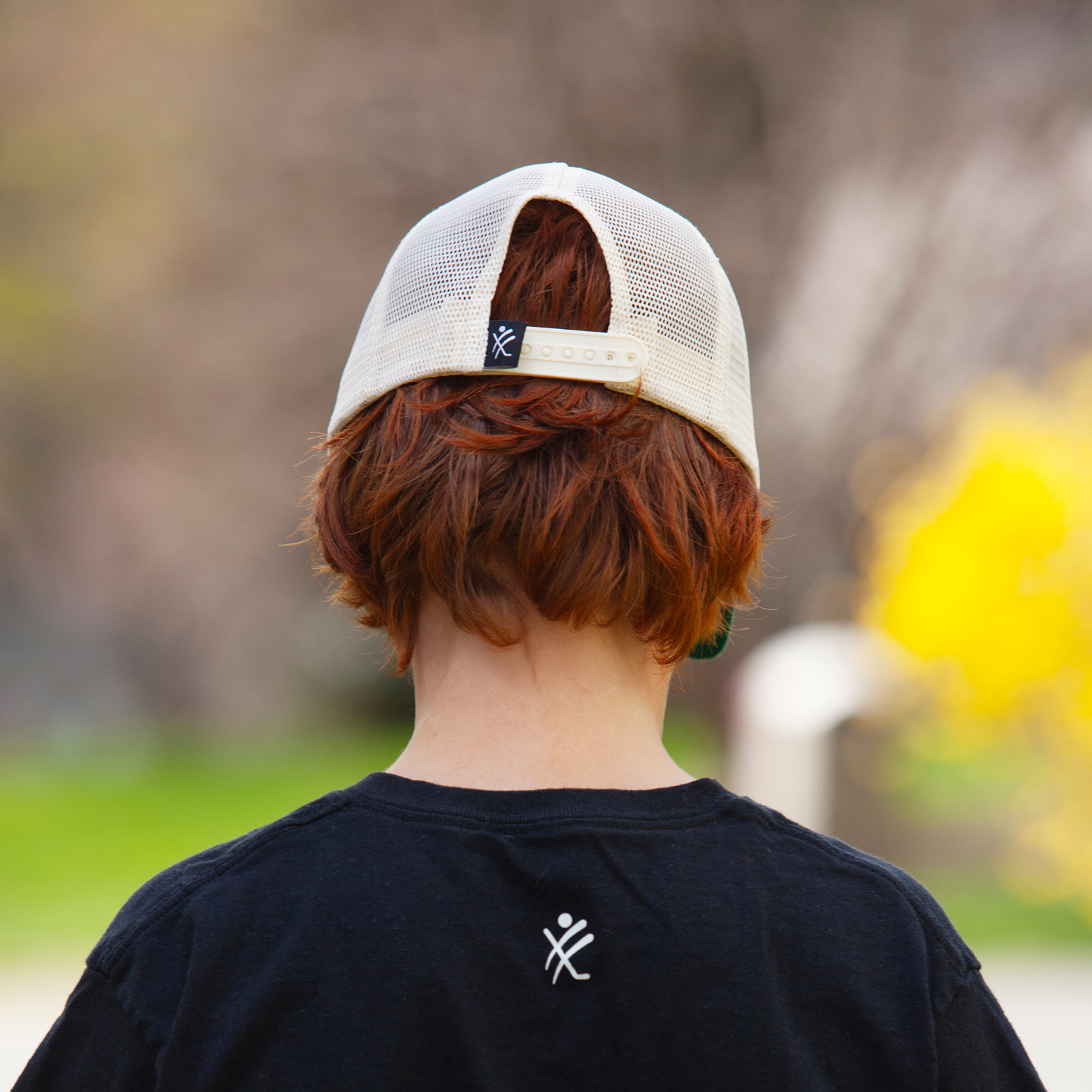 Lets Dangle Hockey Baseball Cap Green - back view on model in natural light